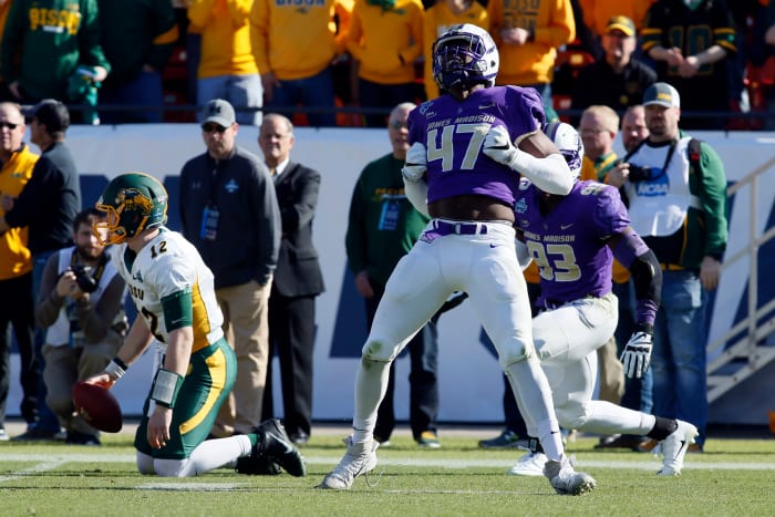 Jan 6, 2018; Frisco, TX, USA; James Madison Dukes defensive lineman Darrious Carter (47) celebrates a sack against North Dakota State Bison quarterback Easton Stick (12) in the first quarter at Toyota Stadium.